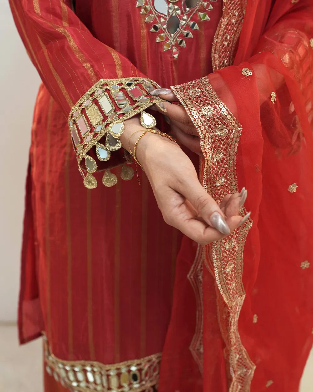 Crepe silk stripe design mirror worked salwar suit-red