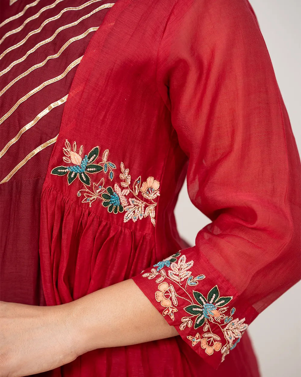 Double shaded panelled and gathered anarkali suit- red